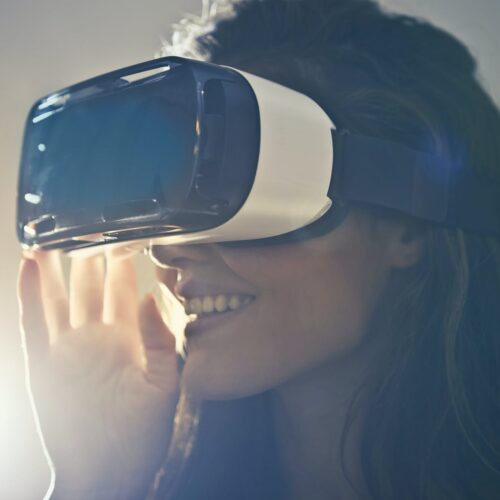 man wearing white virtual reality goggles